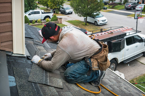 Professional Flat Roof Repair technician working in Rufus, OR
